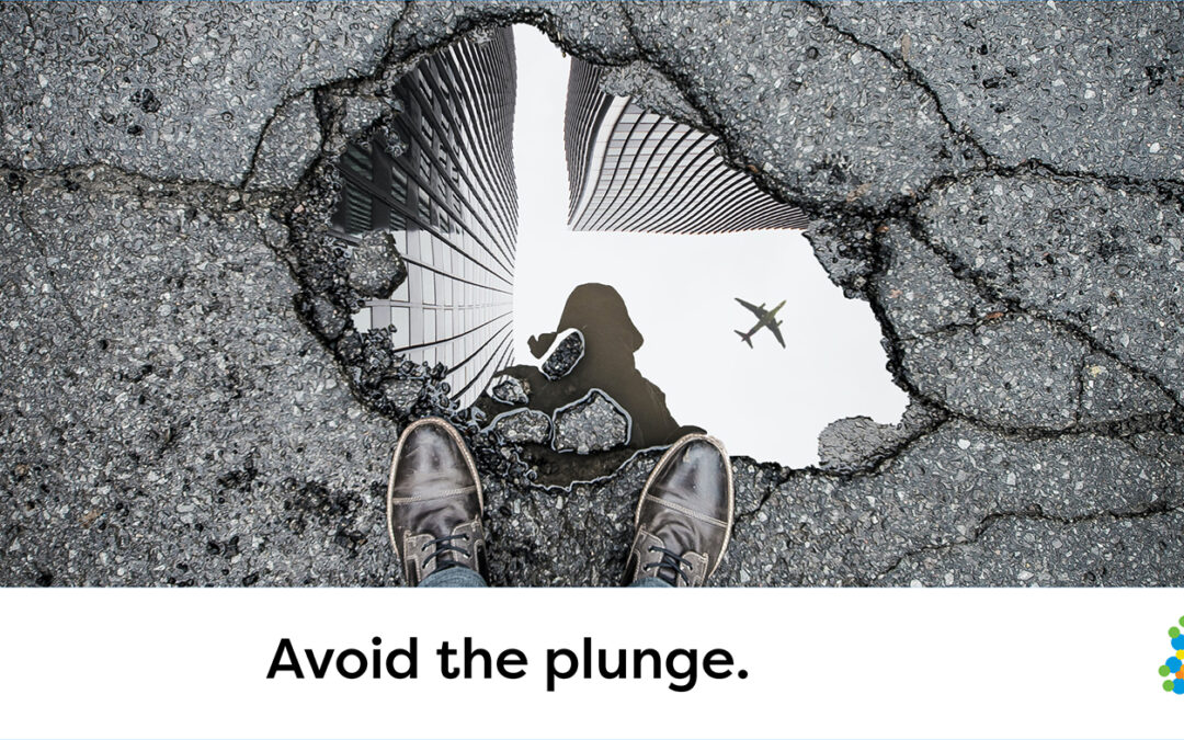 Image of a pothole with text "Avoid the plunge."
